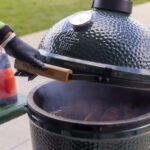 big green egg smoking from grilling food at the ohio eggfest cooking competition