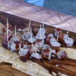 the ohio eggfest big green egg food festival bbq competition smoked sausage samples on cutting board