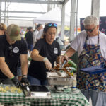 the ohio eggfest big green egg food festival bbq competition team cleary company grilling food and handing out samples